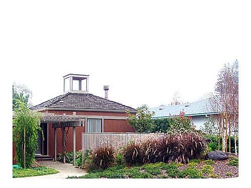 Entrance Here the red vegetation provides the necessary color coordination with the landscape design.