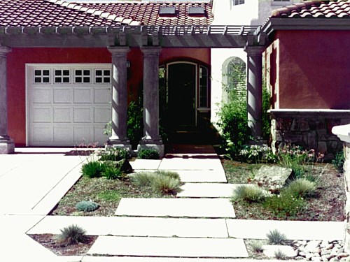 Entrance Matching the color of the residence was a natural decision here. Providing spaces between the concrete pads allowed mint to grow. Mint, if stepped on, brings the scent of mint into the home.