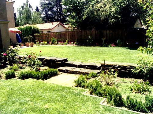 Sunken Garden This sunken space was necessary to save the heritage oak seen in the picture. Oak trees, with their trunks covered in soil, are vulnerable to disease. This sunken patio is both an opportunity and a necessity.